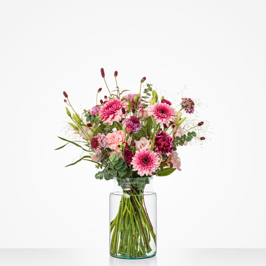 Rond boeket met roze bloemen